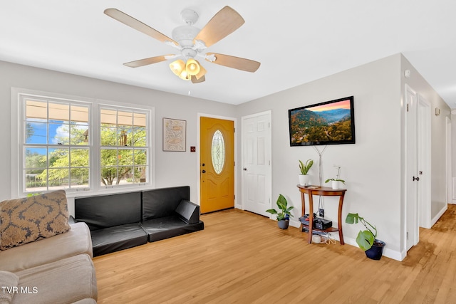 324 Reservoir St, Bristol, VA 24201 - living room featuring wood finished floors, baseboards, and ceiling fan