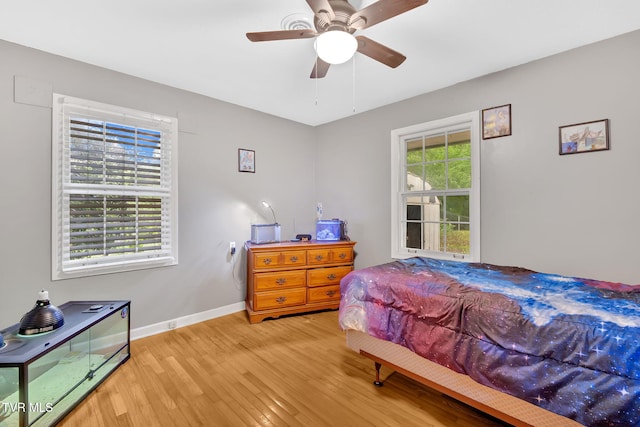 324 Reservoir St, Bristol, VA 24201 - bedroom with wood finished floors, baseboards, and ceiling fan