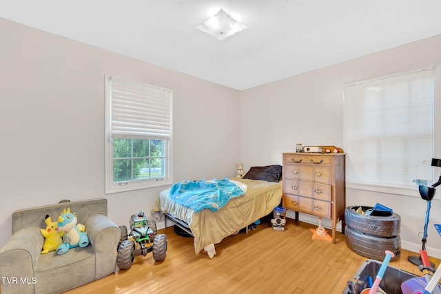 324 Reservoir St, Bristol, VA 24201 - bedroom featuring wood finished floors and baseboards