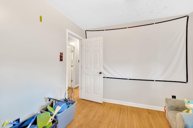 324 Reservoir St, Bristol, VA 24201 - recreation room featuring light wood-style flooring, baseboards, and lofted ceiling