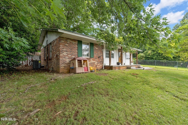 324 Reservoir St, Bristol, VA 24201 - view of front of house featuring brick siding and central air condition unit