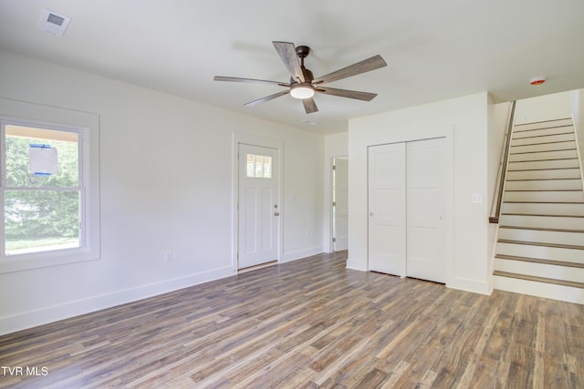 408 Levelin St, Erwin, TN 37650 - unfurnished living room with a ceiling fan, wood finished floors, baseboards, and stairs