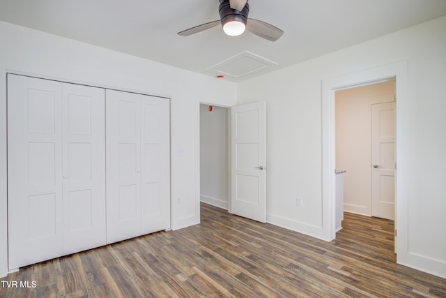 408 Levelin St, Erwin, TN 37650 - unfurnished bedroom featuring attic access, wood finished floors, a closet, baseboards, and a ceiling fan