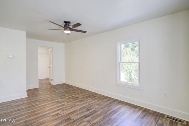 408 Levelin St, Erwin, TN 37650 - spare room with a ceiling fan, dark wood-type flooring, and baseboards