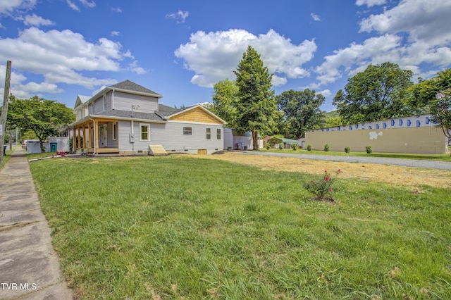 408 Levelin St, Erwin, TN 37650 - rear view of property with a lawn and roof with shingles