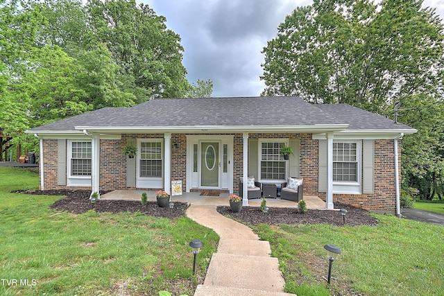 420 Brookwood Dr, Bristol, TN 37620 - ranch-style home featuring a front lawn, covered porch, brick siding, and a shingled roof