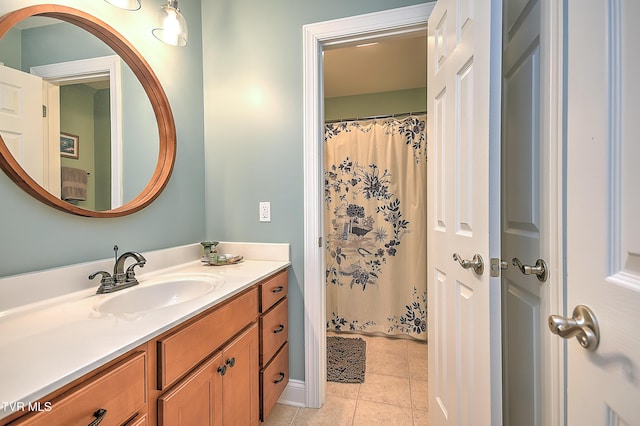 410 Grovemont Pl, Piney Flats, TN 37686 - full bath featuring vanity, tile patterned flooring, and a shower with shower curtain