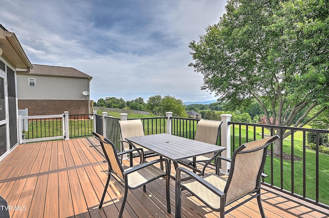 410 Grovemont Pl, Piney Flats, TN 37686 - wooden deck with outdoor dining area and a lawn