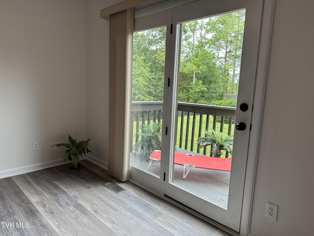 516 Fleetwood Ct Unit F, Kingsport, TN 37660 - doorway to outside featuring wood finished floors and baseboards