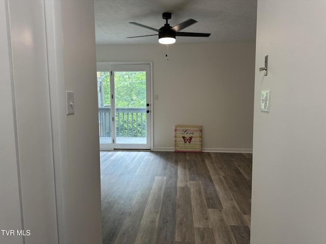 516 Fleetwood Ct Unit F, Kingsport, TN 37660 - spare room featuring wood finished floors, ceiling fan, baseboards, and a textured ceiling