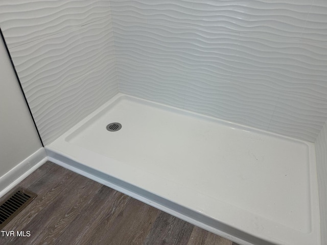 516 Fleetwood Ct Unit F, Kingsport, TN 37660 - bathroom with wood finished floors, baseboards, and a shower