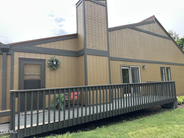 516 Fleetwood Ct Unit F, Kingsport, TN 37660 - view of property exterior featuring a wooden deck and a chimney