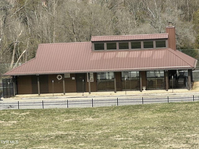 516 Fleetwood Ct Unit F, Kingsport, TN 37660 - view of front of house featuring a chimney and metal roof