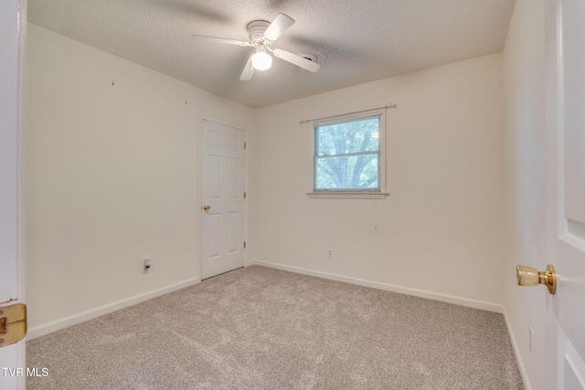 219 Meridale Dr, Johnson City, TN 37601 - carpeted spare room with ceiling fan, a textured ceiling, and baseboards