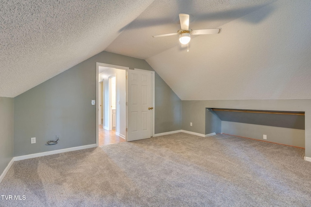219 Meridale Dr, Johnson City, TN 37601 - bonus room featuring carpet, lofted ceiling, baseboards, and a textured ceiling