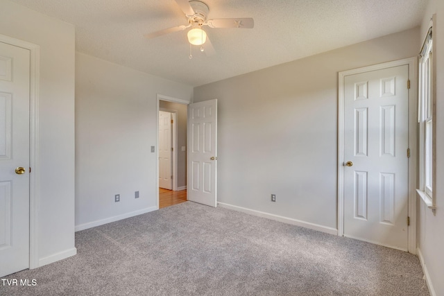 219 Meridale Dr, Johnson City, TN 37601 - unfurnished bedroom featuring carpet flooring, baseboards, and ceiling fan
