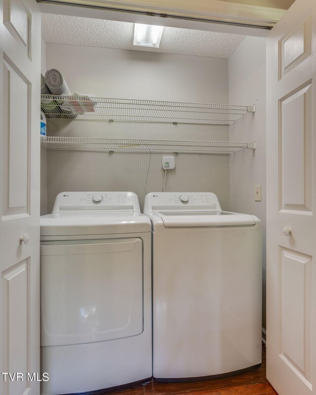 219 Meridale Dr, Johnson City, TN 37601 - laundry room with washer and dryer and dark wood finished floors