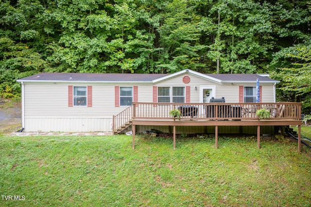 6855 Gate City Hwy, Bristol, VA 24202 - manufactured / mobile home featuring a wooden deck and a front lawn