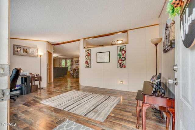 6855 Gate City Hwy, Bristol, VA 24202 - home office with wood finished floors, crown molding, and a textured ceiling