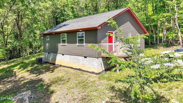 515 Aesque St Ext, Kingsport, TN 37665 - view of property exterior with crawl space, a shingled roof, a forest view, and central AC unit