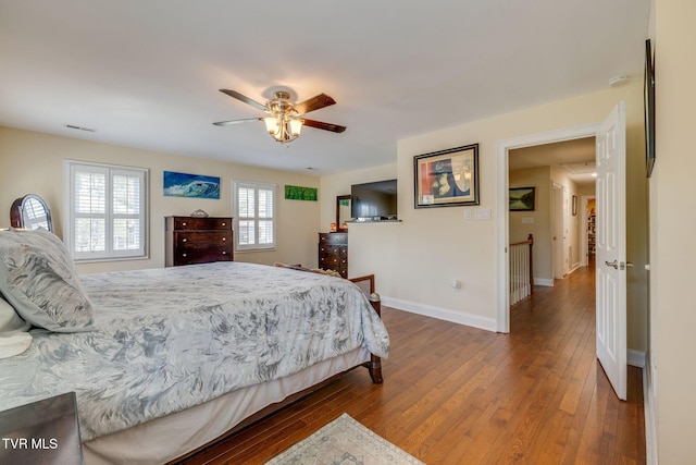 2001 Springfield Ave, Kingsport, TN 37664 - bedroom with wood-type flooring, baseboards, and ceiling fan