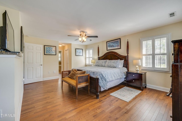 2001 Springfield Ave, Kingsport, TN 37664 - bedroom with wood finished floors, baseboards, and a ceiling fan