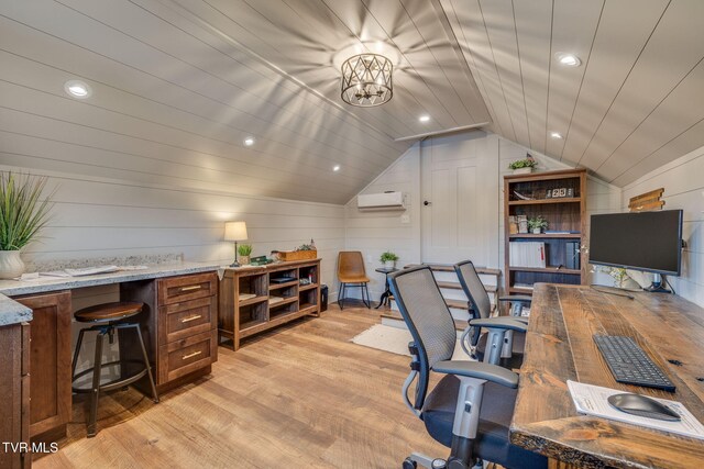 110 Emmanuel Dr, Johnson City, TN 37601 - home office with a wall unit AC, vaulted ceiling, light wood finished floors, and wooden walls