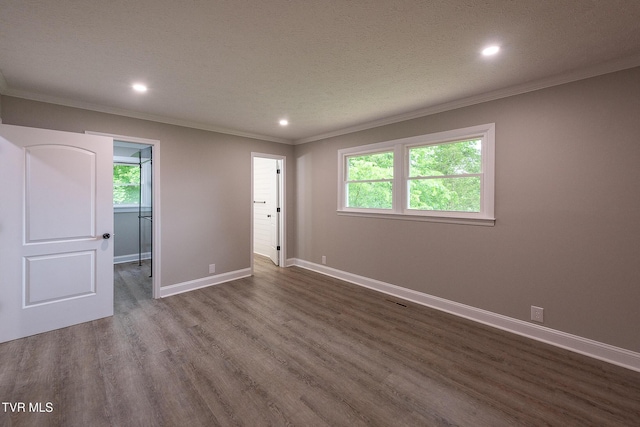 1236 Nassau Dr, Kingsport, TN 37660 - empty room with crown molding, dark wood-type flooring, baseboards, and recessed lighting