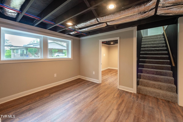 1236 Nassau Dr, Kingsport, TN 37660 - below grade area featuring wood finished floors, stairway, and baseboards