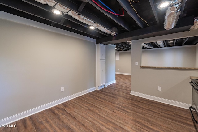 1236 Nassau Dr, Kingsport, TN 37660 - finished basement featuring wood finished floors and baseboards