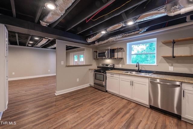 1236 Nassau Dr, Kingsport, TN 37660 - kitchen with stainless steel appliances, a sink, white cabinets, and dark wood-type flooring