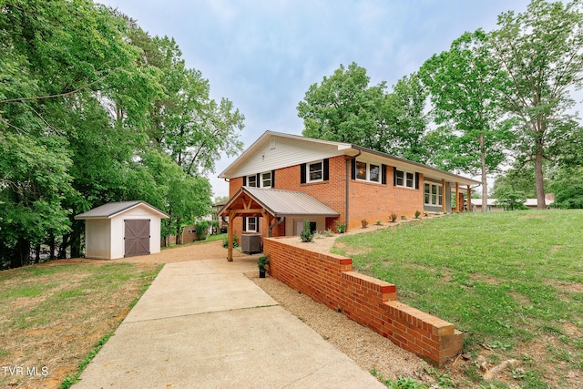 1236 Nassau Dr, Kingsport, TN 37660 - view of front of house with a front lawn, central air condition unit, and brick siding