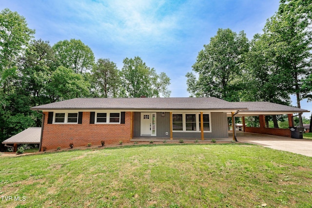 1236 Nassau Dr, Kingsport, TN 37660 - single story home featuring a front yard, a carport, driveway, and brick siding