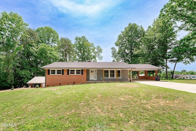 1236 Nassau Dr, Kingsport, TN 37660 - ranch-style house with concrete driveway, a front yard, an attached carport, and brick siding