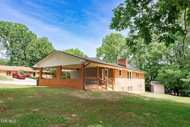 1236 Nassau Dr, Kingsport, TN 37660 - single story home with a chimney, brick siding, and a front yard
