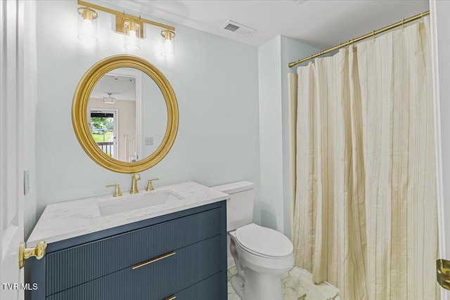 2700 Indian Ridge Rd Unit 12, Johnson City, TN 37604 - full bathroom with toilet, vanity, marble look tiles, and a shower with curtain