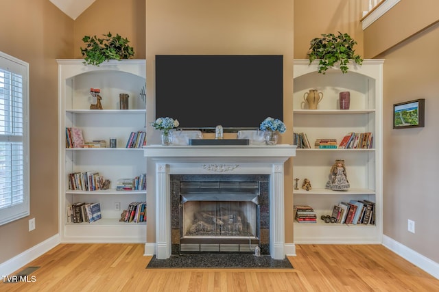 220 Michaels Ridge Blvd, Johnson City, TN 37615 - living room with wood finished floors, baseboards, and a fireplace