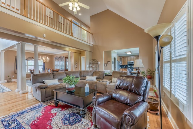 220 Michaels Ridge Blvd, Johnson City, TN 37615 - living room featuring decorative columns, baseboards, wood finished floors, and high vaulted ceiling