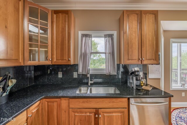 220 Michaels Ridge Blvd, Johnson City, TN 37615 - kitchen with stainless steel dishwasher, a sink, glass insert cabinets, brown cabinets, and ornamental molding