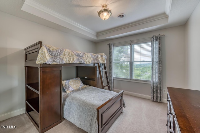 220 Michaels Ridge Blvd, Johnson City, TN 37615 - bedroom with ornamental molding, a tray ceiling, baseboards, and light carpet