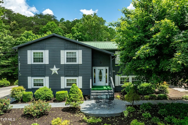 524 Mountain View Dr, Piney Flats, TN 37686 - view of front of home with metal roof and a standing seam roof