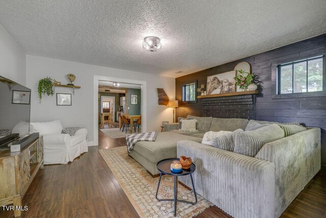 3901 Rocky Hill Ln, Kingsport, TN 37660 - living area with a textured ceiling, dark wood-type flooring, and baseboards