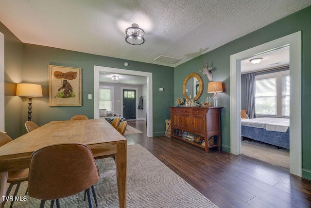 3901 Rocky Hill Ln, Kingsport, TN 37660 - dining room with wood finished floors, baseboards, and a textured ceiling