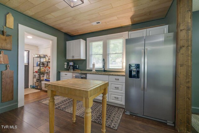 3901 Rocky Hill Ln, Kingsport, TN 37660 - kitchen with appliances with stainless steel finishes, a sink, white cabinetry, dark wood finished floors, and wooden ceiling