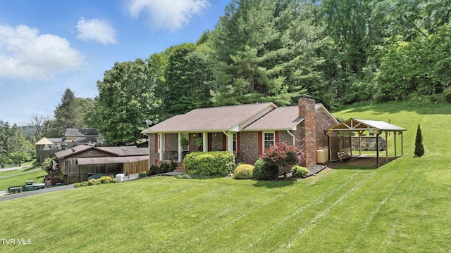 5009 Surrey Dr, Kingsport, TN 37664 - view of front facade featuring a gazebo, a chimney, a front lawn, and brick siding