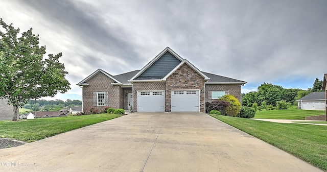 1030 Savin Fls, Gray, TN 37615 - craftsman inspired home with a garage, concrete driveway, a front lawn, and stone siding