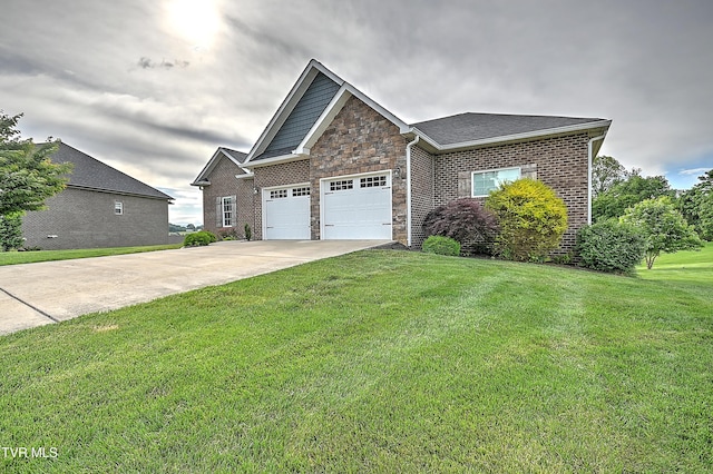 1030 Savin Fls, Gray, TN 37615 - view of front of home with a garage, concrete driveway, a front yard, and brick siding
