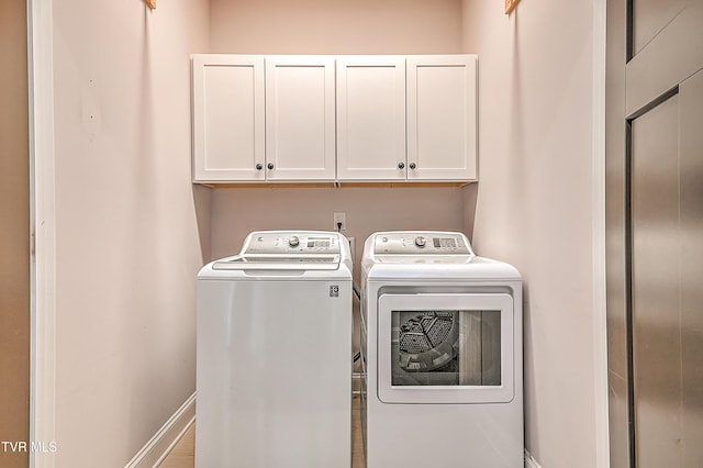1030 Savin Fls, Gray, TN 37615 - washroom with separate washer and dryer, cabinet space, and baseboards