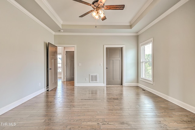 1030 Savin Fls, Gray, TN 37615 - unfurnished bedroom with a tray ceiling, wood-type flooring, ornamental molding, baseboards, and ceiling fan