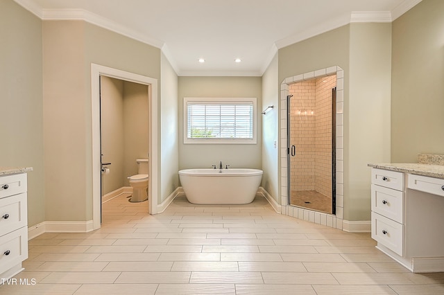 1030 Savin Fls, Gray, TN 37615 - bathroom with vanity, a freestanding bath, a stall shower, ornamental molding, and recessed lighting